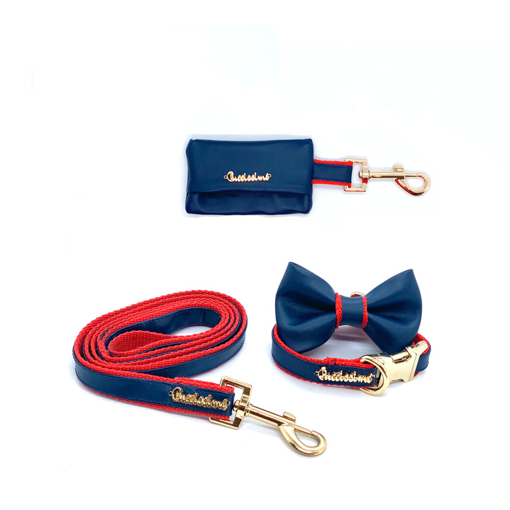 Puccissime Cardinal red and navy luxury vegan leather matching set. Dog collar, bow tie, dog leash and dog poop bag. Made in Canada.