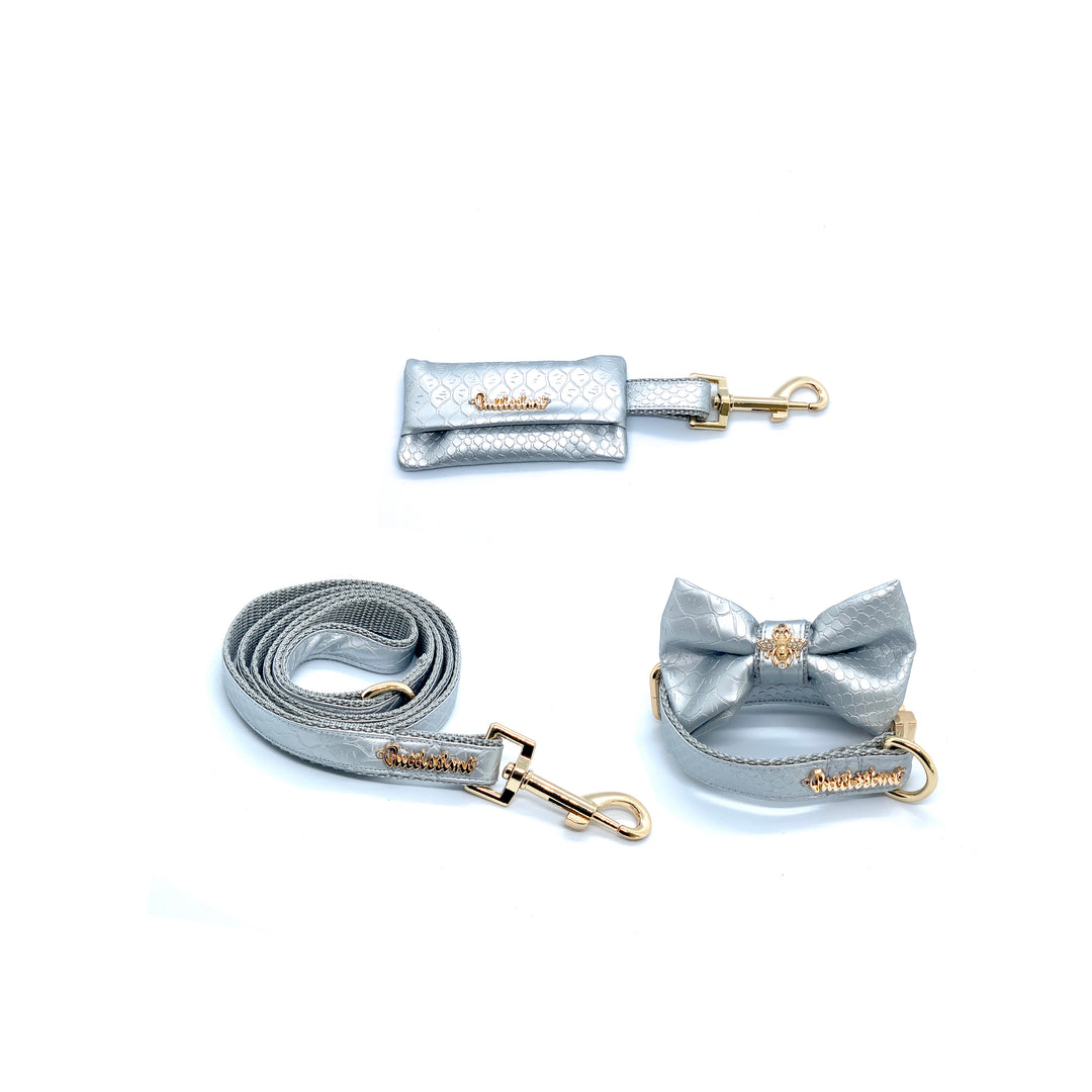 Puccissime Diva silver luxury vegan leather matching set. Dog collar, bow tie, dog leash and dog poop bag. Made in Canada.