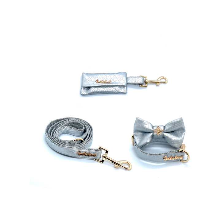 Puccissime Diva silver luxury vegan leather matching set. Dog collar, bow tie, dog leash and dog poop bag. Made in Canada.