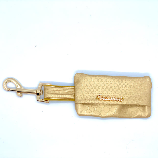 Puccissime Amulet gold luxury vegan leather dog poop bag. Made in Canada.