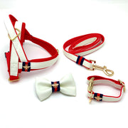 Puccissime La Parisienne white and red luxury vegan leather dog accessories matching set. Norwegian one click no pull no choke no mat easy wear dog harness, dog collar bow tie and dog leash. MADE IN CANADA.