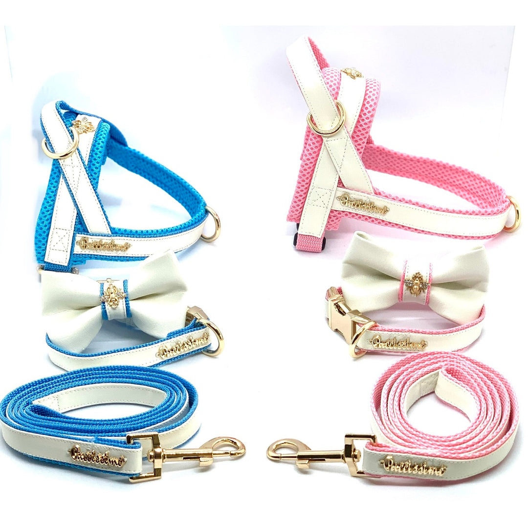 Puccissime My baby girl pink and white luxury vegan leather dog accessories matching set. Norwegian one click no pull no choke no mat easy wear dog harness, dog collar bow tie and leash and dog poop bag. MADE IN CANADA.