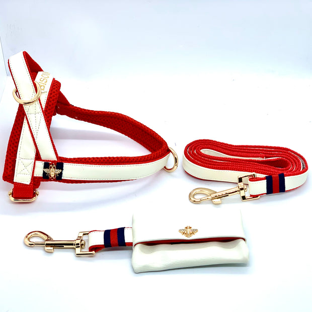 Puccissime La Parisienne white and red luxury vegan leather dog accessories matching set. Norwegian one click no pull no choke no mat easy wear dog harness, dog collar and leash and dog poop bag. MADE IN CANADA.