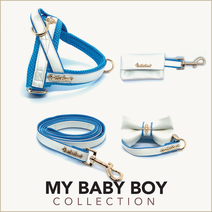 Puccissime My baby boy blue and white luxury vegan leather dog accessories matching set. Norwegian one click no pull no choke no mat easy wear dog harness, dog collar bow tie and leash and dog poop bag. MADE IN CANADA.