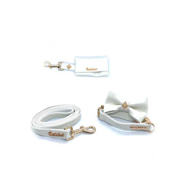 Puccissime Swan white luxury vegan leather matching set. Dog collar, bow tie, dog leash and dog poop bag. Made in Canada.