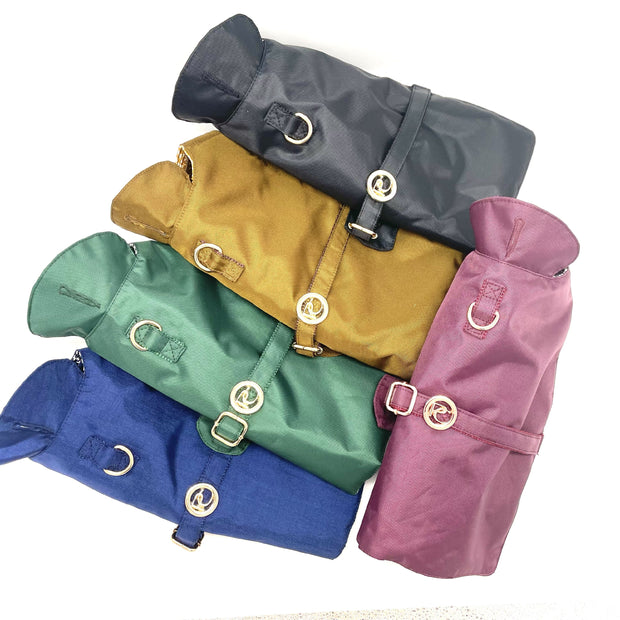Puccissime dog rain jackets- Back, Gold, Burgandy, Green & Blue colours. MADE IN CANADA.