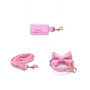 Puccissime Rosie pink luxury vegan leather matching set dog collar, bow tie, dog leash and poop bag. Made in Canada.